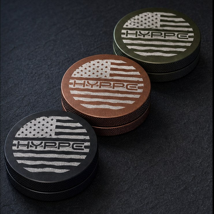 Finished engraved HYPPE cans in black, copper and camo green